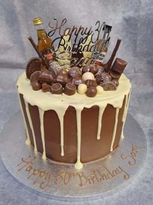 DC023 Drip cake with topper & mini alcohol bottles - Ravens Bakery of