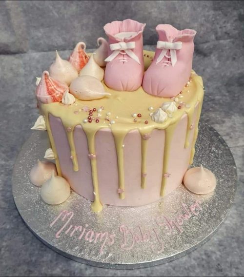 Pink handbag and shoe drip cake went - Nina's Cakey Bakies